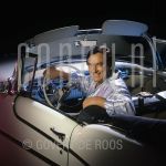 John Spencer (Date Unknown) at studio in Amsterdam.

[keywords]Posed, Half Length, Eyecontact, Smiling, Car[/keywords]